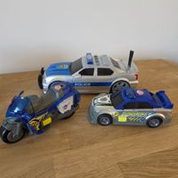 Drei Dickie Toys Polizeifahrzeuge mit geträusche autos