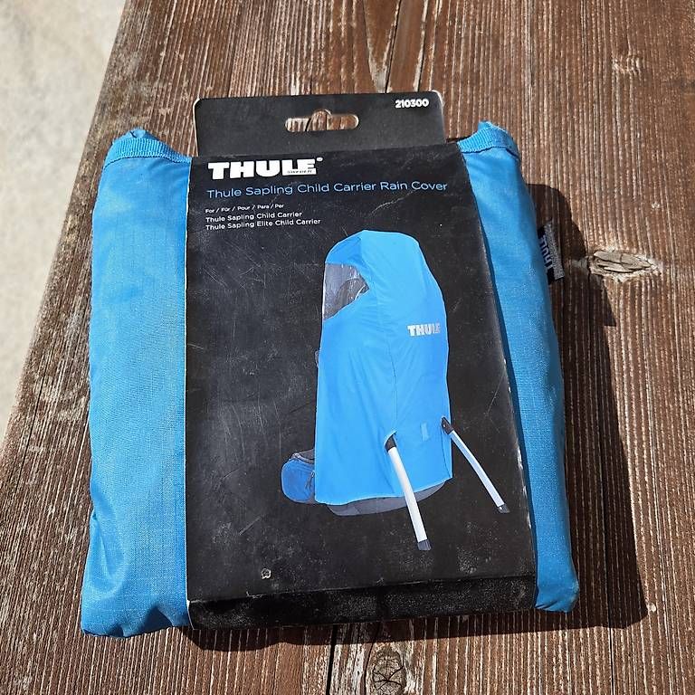 Rucksäcke: Thule Sapling Wanderrucksack Kindertrage - Regenschutz - Neu – Neu und originalverpackt aus Hägendorf von PRvR