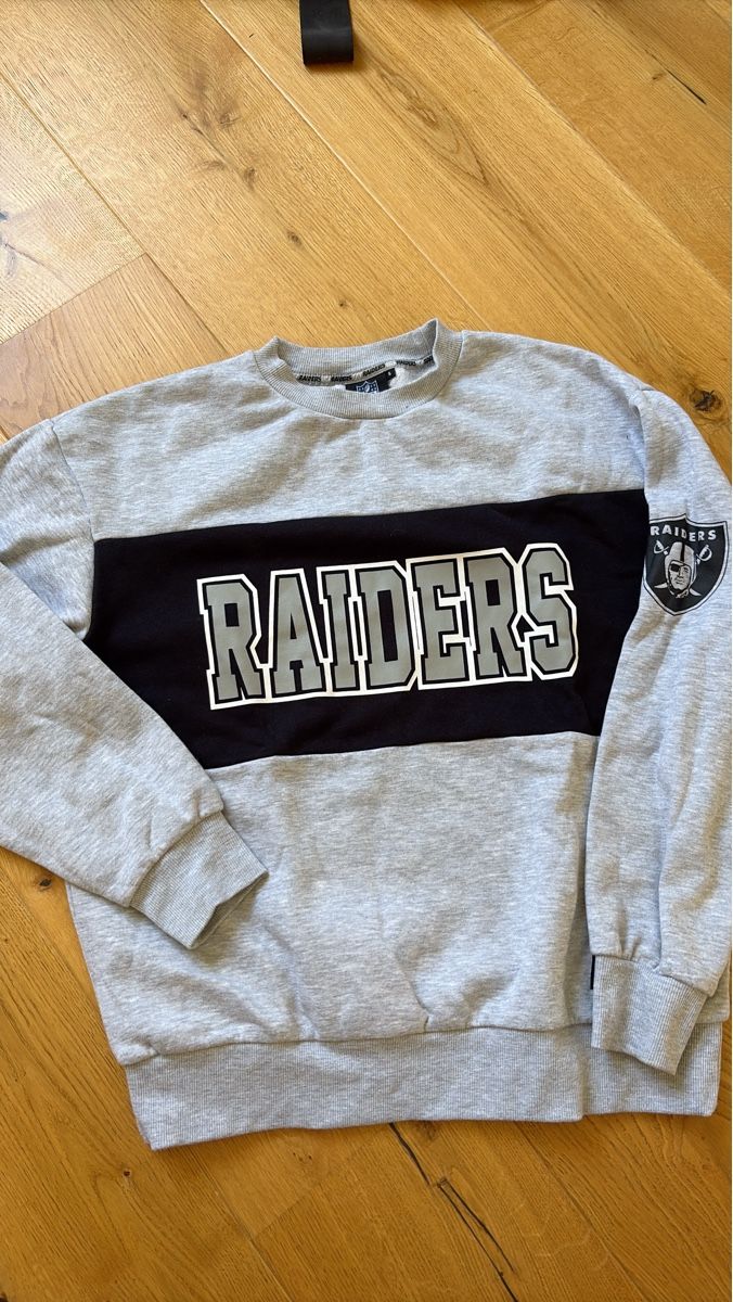 Maglioni & Felpe: Grauer Sweater Raiders, Grösse S, neu – Nuovo (secondo la descrizione) da Buchs ZH venduto da AlexM8511