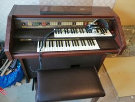 Orgel mit Kopfhörer