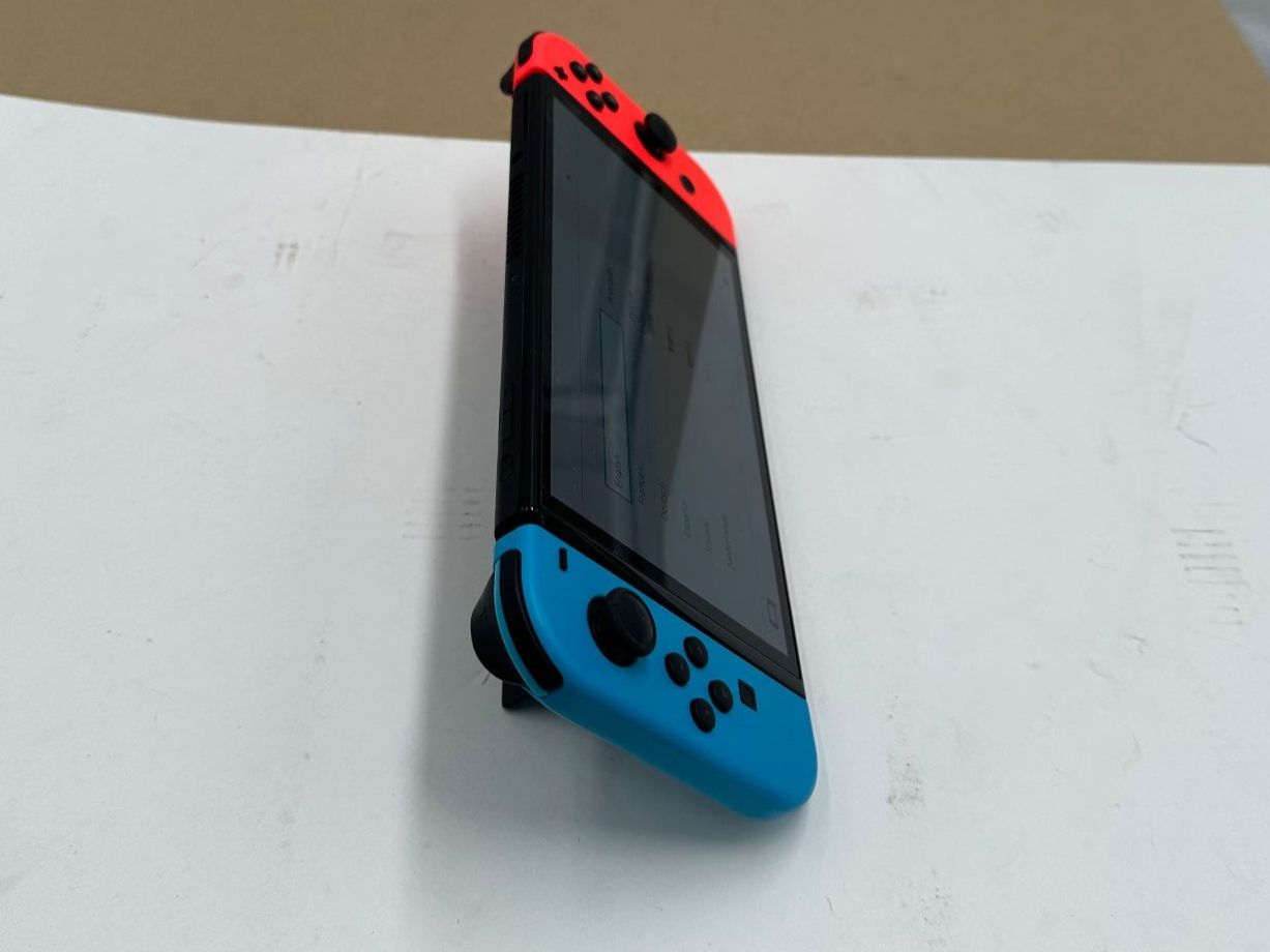 Nintendo Konsolen: NINTENDO Switch OLED-Modell, Neon-Blau/Neon-Rot – Gebraucht aus Birmenstorf AG von Distronics_SchweizAG 3