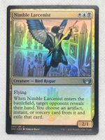 MTG Nimble Larcenist SNC 205 Englisch Foil Uncommon