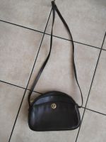 Sac à main vintage élégant en cuir véritable marron Pourchet