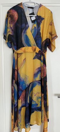 New very comfortable dress with two pockets size S