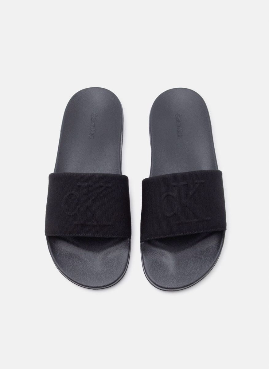 Calvin Klein Scarpe da uomo: Calvin Klein Mules - triple black pointure 44 – Nuovo e nell'imballaggio originale da Urtenen-Schönbühl venduto da Big.sanad