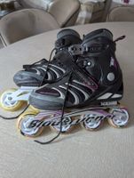 Schwarze und silberne Rollschuhe, Größe 42
