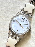 Swatch Damen Uhr mit Kleeblatt-Armband, elegant & chic!