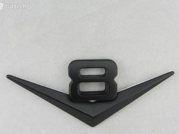 Tutti pezzi di ricambio auto: V8 Emblem aus Metall mit Klebepad schwarz – Nuovo e nell'imballaggio originale da Dürnten venduto da Boarsale
