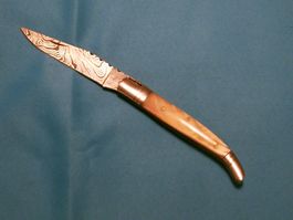 Laguiole Taschenm. Damaststahl, Horngriff-Miel, Lederetui