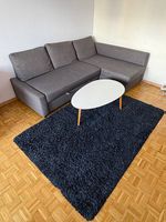 Canapé convertible FRIHETEN + tapis VOLLERSLEV + table basse