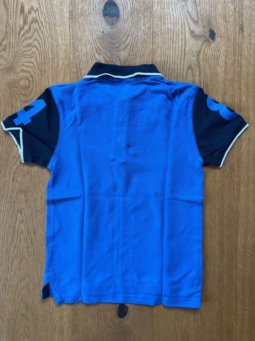 Camicie, T-shirt & Polo: Poloshirt Migros Kids 122 – Usato da Lengnau BE venduto da Rubin27 1