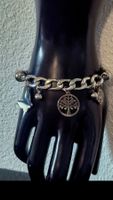Bracciale con ciondoli albero e farfalla