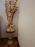 vase em porcelaine avec bouquet des sec