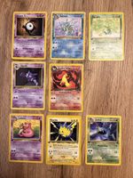 9 Pokémonkarten der ersten Edition