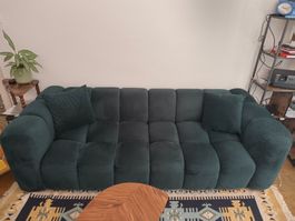 Canapé en velours vert 3 places et son pouf