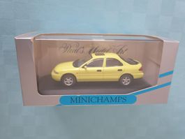 MINICHAMPS Modellauto Ford Mondeo Fliessheck citrusgelb