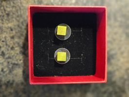 Grüne kubische Ohrstecker
