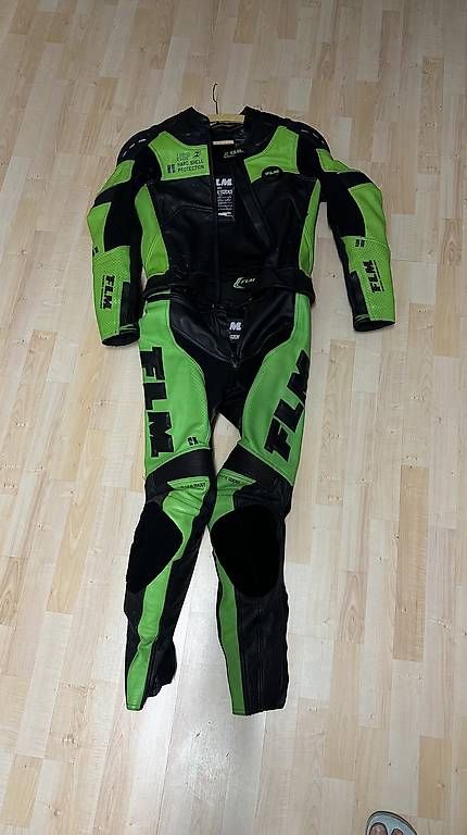 FLM Completi: FLM Lederkombi schwarz / grün Kawasaki – Usato da Zeiningen venduto da AnlikerA