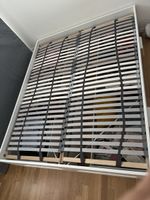 Bed with slatted frame