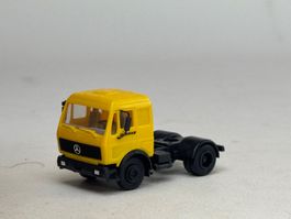 AU- Herpa Mercedes Zugmaschine Danzas gelb