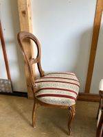 Antiker Stuhl mit elegantem Design