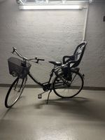 Velo mit Kindersitz