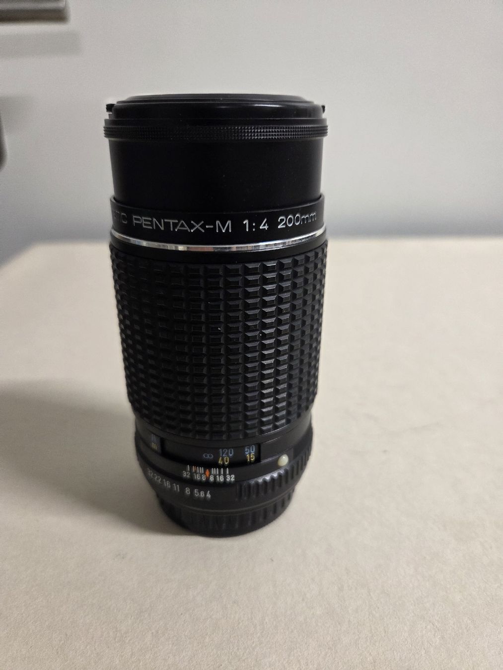 Pentax Obiettivi: SMC PENTAX-M 1:4 200mm Objektiv  – Usato da Dietikon venduto da Allegra34 4