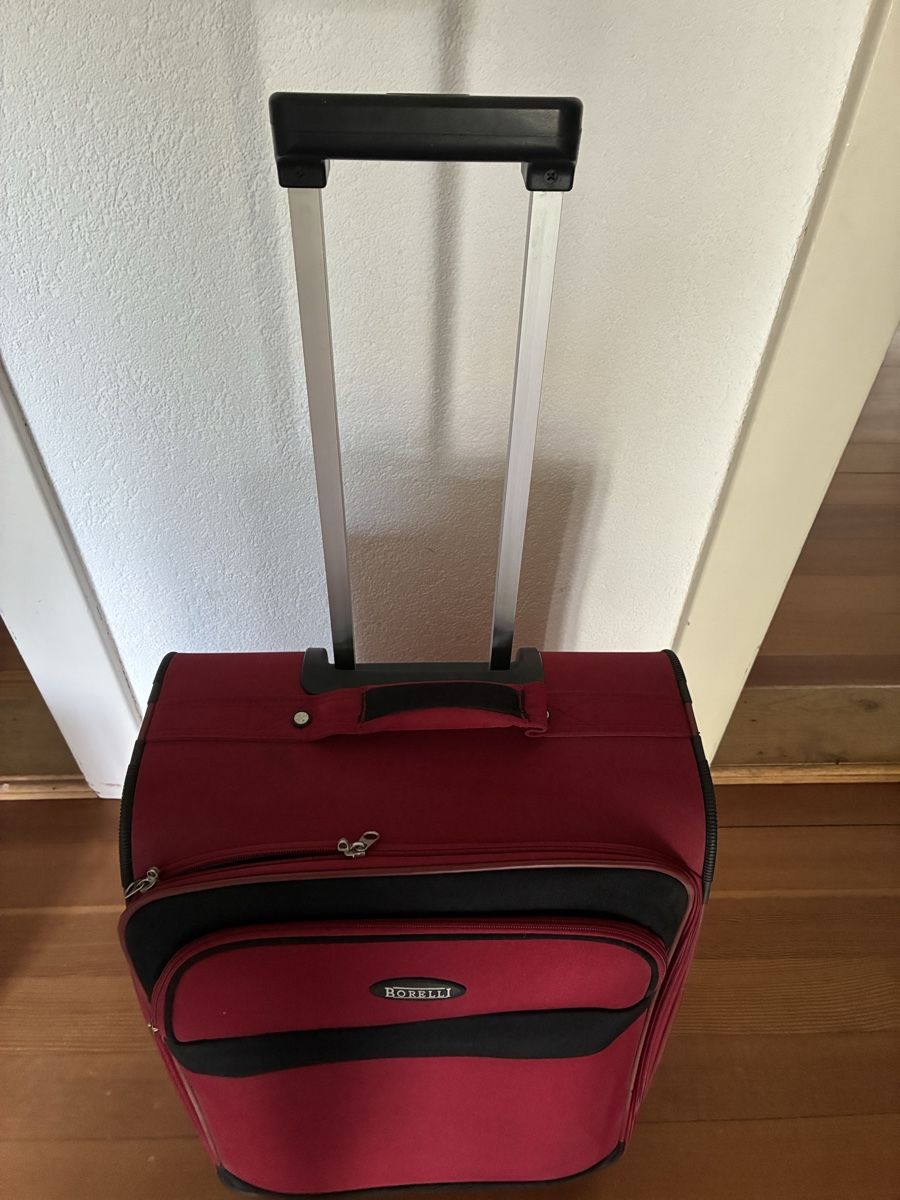 Reisekoffer: Rollkoffer rot ca. 60x25cm – Gebraucht aus Biberist von wacholder 2