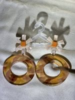 Chunky Plastic Round Earrings with Flower Detail