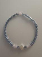 Schönes Perlenarmband mit Kleeblatt-Anhänger 