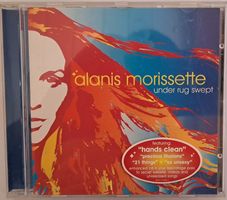 ALANIS MORISSETTE "UNDER RUG SWEPT"