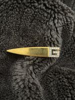 Broche Givenchy