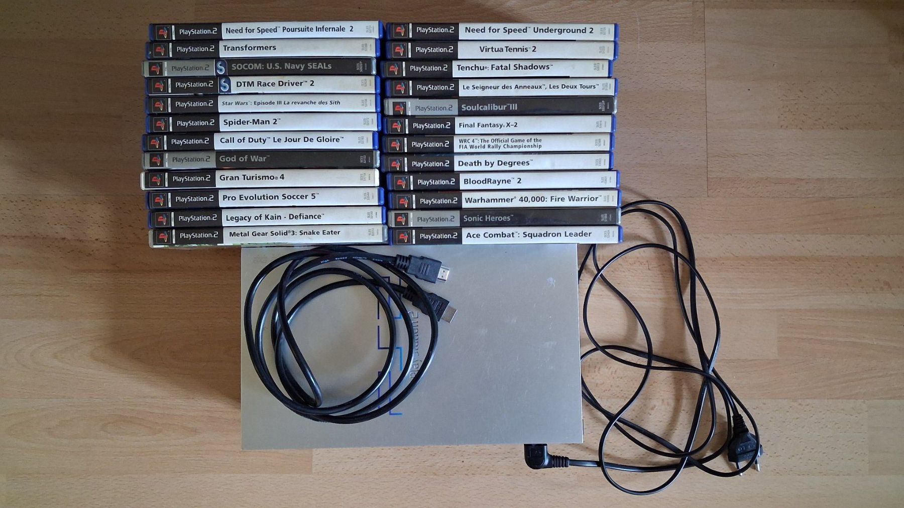 Sony Consoles: Console PlayStation 2 argentée et 24 jeux – D'occasion à Fribourg par mar_wd7v