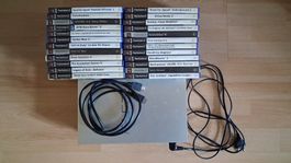 Console PlayStation 2 argentée et 24 jeux