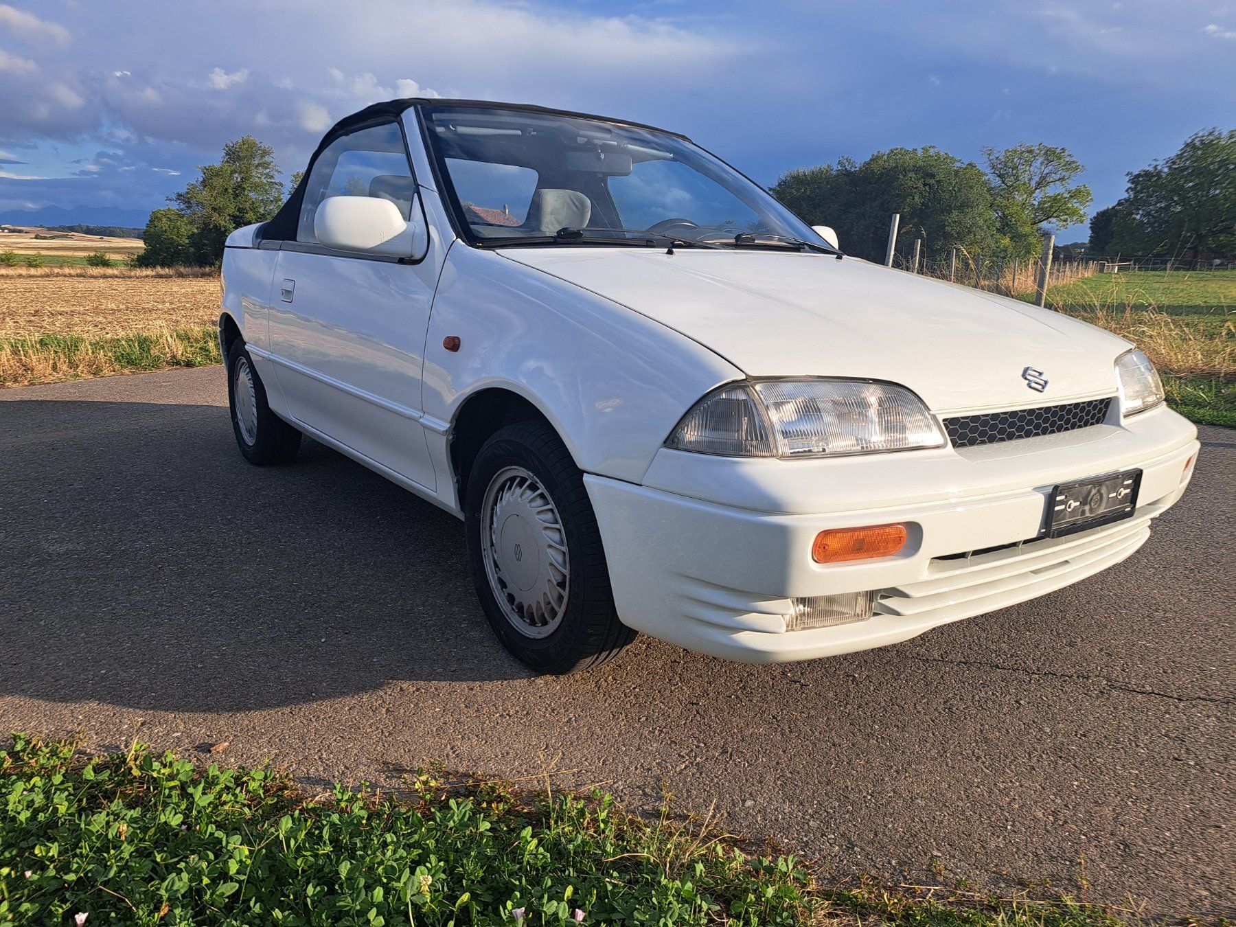 Suzuki Automobili: Cabriolet Suzuki Swift blanc – Usato da Bussigny venduto da pic_zs7v 1