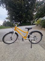Woom 4 Fahrrad