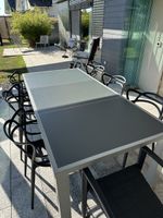 Exklusiver Gartentisch mit Designerstühlen