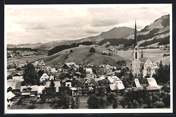 Cartoline postali: AK Escholzmatt, Teilansicht mit Kirche – Usato da Berlin venduto da bartko-reher