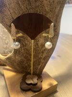 Elegante Ohrringe mit Perle