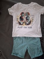 T-Shirt und kurze Hosen