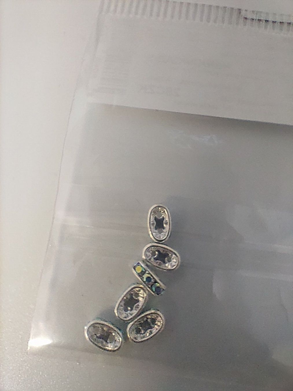 Perle (finte): Strassstein Rondell versilbert crystalAB Doppelloch Twin – Nuovo e nell'imballaggio originale da Thalwil venduto da ersteigerer 1