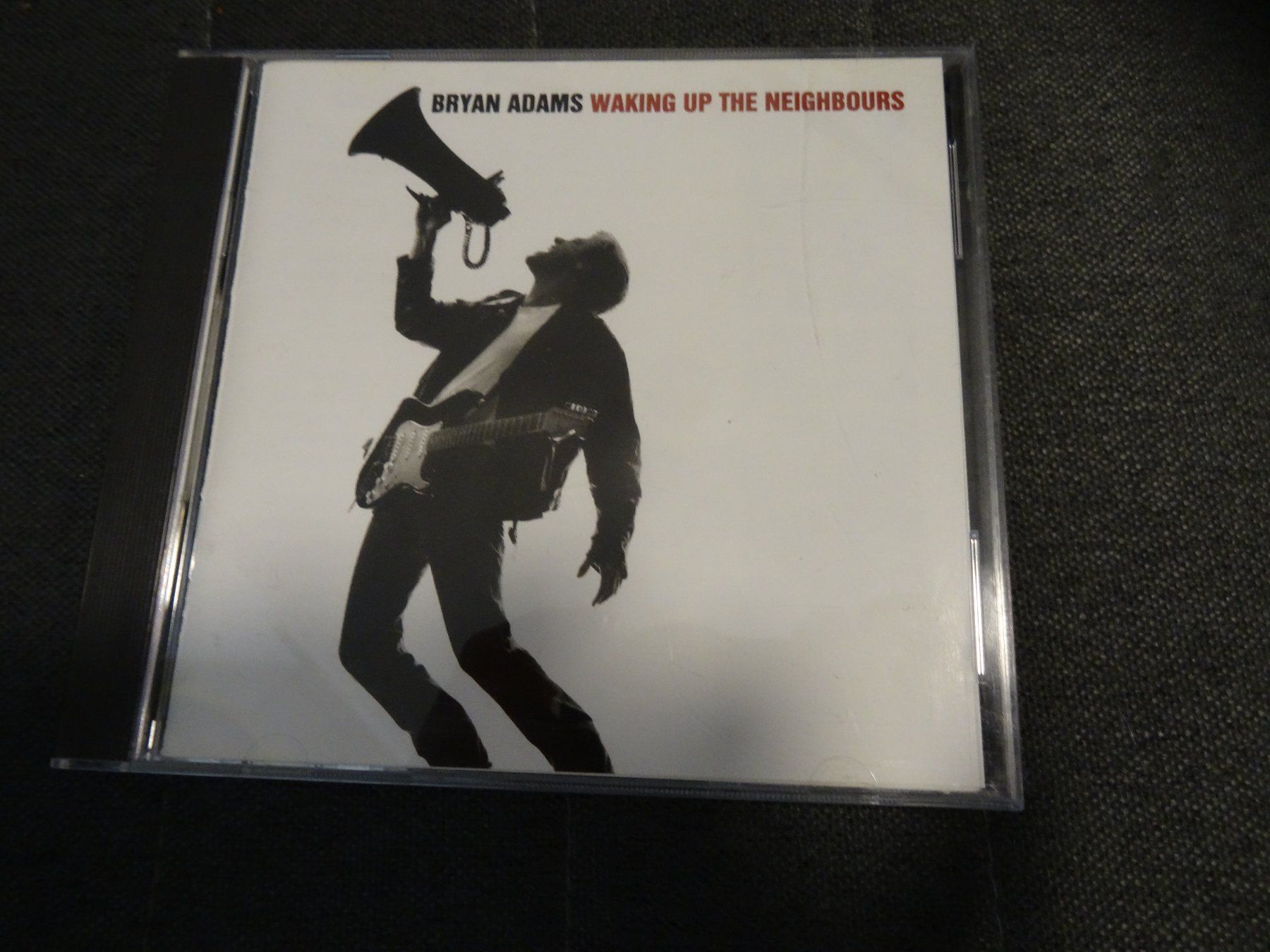CDs: Bryan Adams - Waking Up the Neighbours CD – Gebraucht aus Olten von Disc-Ausverkauf