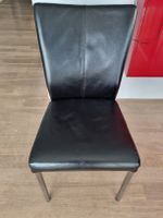 8x Schwarze Leder Stühle