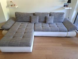 Ecksofa in Grau-Weiss, 180x180 mit Bettfunktion