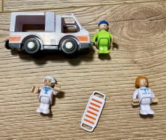 Ambulanz Spielzeugauto mit Figuren und Trage guter Zustand