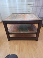 Couchtisch aus Holz und Metall