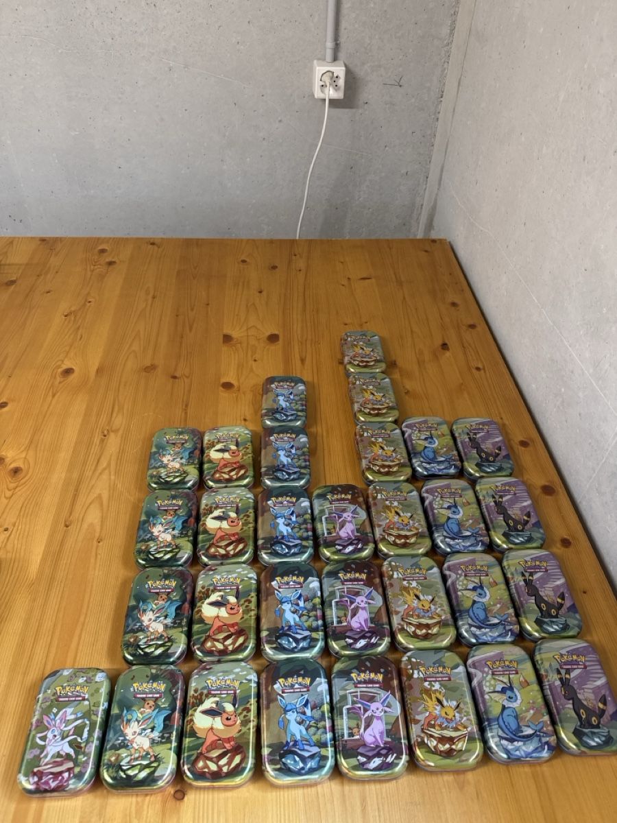 Pokémon Sammelbilder & Trading cards: 31x leere Mini Tin Prismatic Evolution Englisch – Gebraucht aus Härkingen von iceman1234