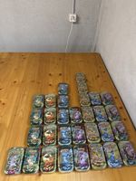 31x leere Mini Tin Prismatic Evolution Englisch