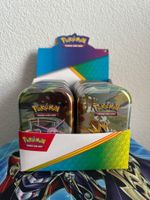 Pokémon Prismatic Evolution – 10x Mini Tin Display  - EN