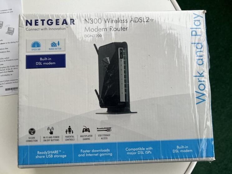 Netgear Modems & Routeurs: Netgear N300 Wireless ADSL2+ MODEM ROUTER - ORIGINALVERPACKT – Neuf avec emballage d'origine à Neuhausen par Ematrix